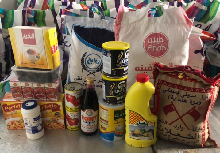 روافد النصبة الخيرية تبدأ بتوزيع السلال الرمضانية على المستفيدين.